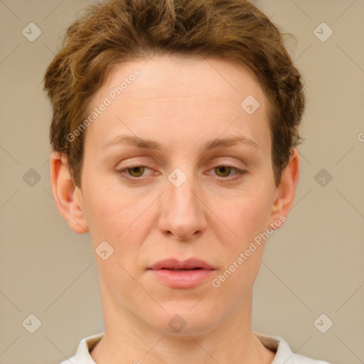 Joyful white adult female with short  brown hair and brown eyes