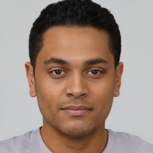 Neutral latino young-adult male with short  black hair and brown eyes