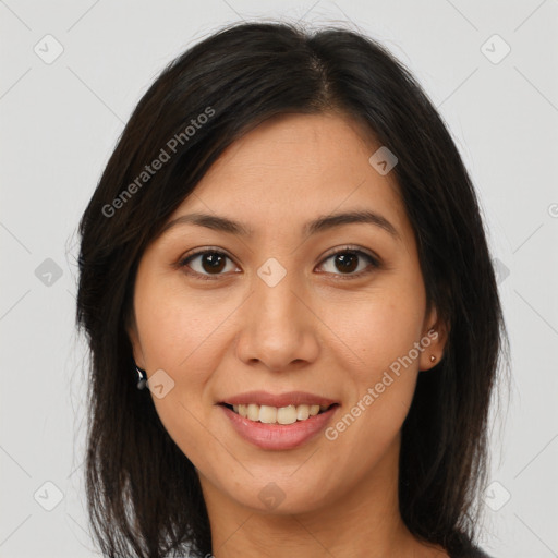 Joyful asian young-adult female with long  brown hair and brown eyes