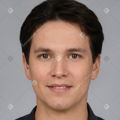 Joyful white young-adult male with short  brown hair and brown eyes