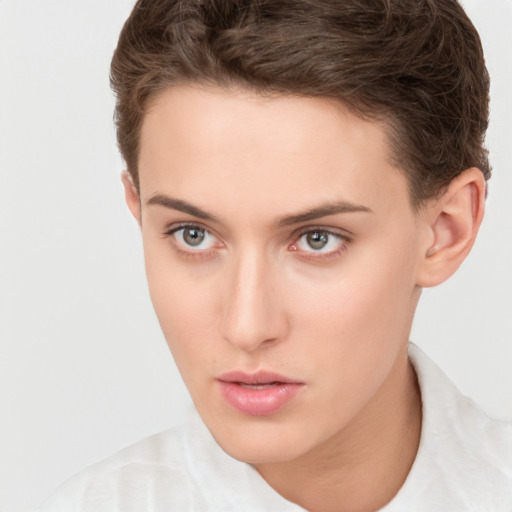 Neutral white young-adult female with short  brown hair and brown eyes