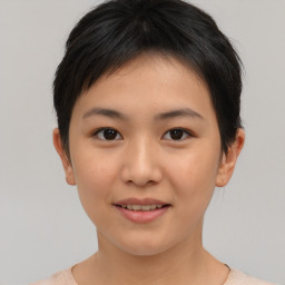 Joyful asian young-adult female with short  brown hair and brown eyes