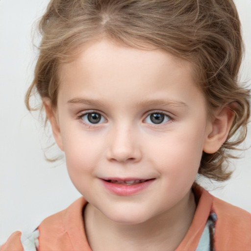 Joyful white child female with medium  brown hair and grey eyes