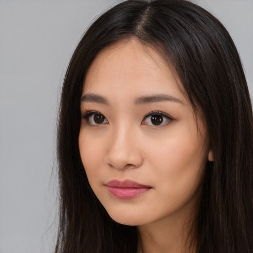 Neutral asian young-adult female with long  brown hair and brown eyes