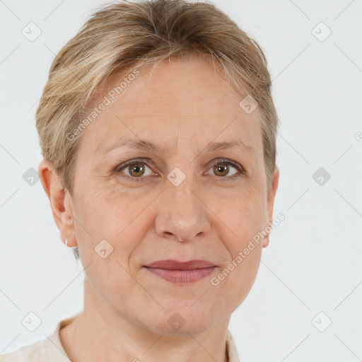 Joyful white adult female with short  brown hair and brown eyes