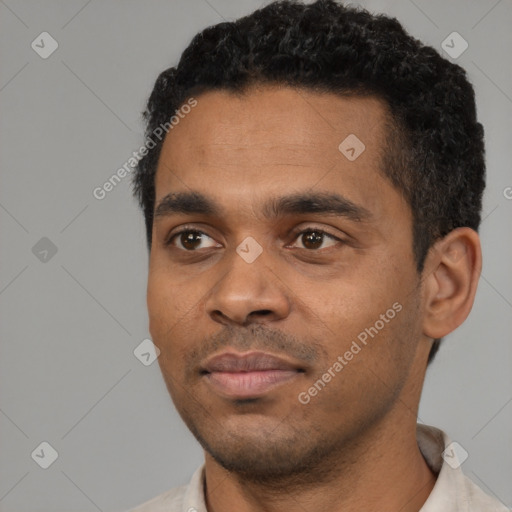 Neutral black young-adult male with short  black hair and brown eyes