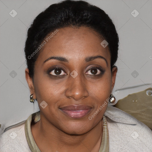 Joyful black young-adult female with short  brown hair and brown eyes