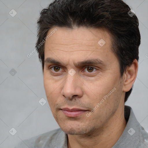 Neutral white adult male with short  brown hair and brown eyes