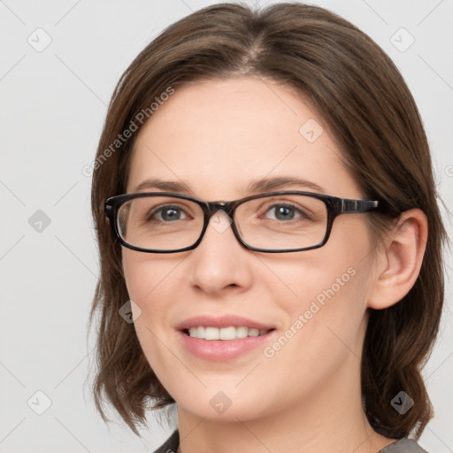 Joyful white young-adult female with medium  brown hair and blue eyes