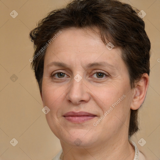 Joyful white adult female with short  brown hair and brown eyes