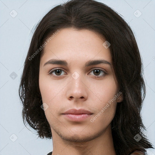 Neutral white young-adult female with long  brown hair and brown eyes