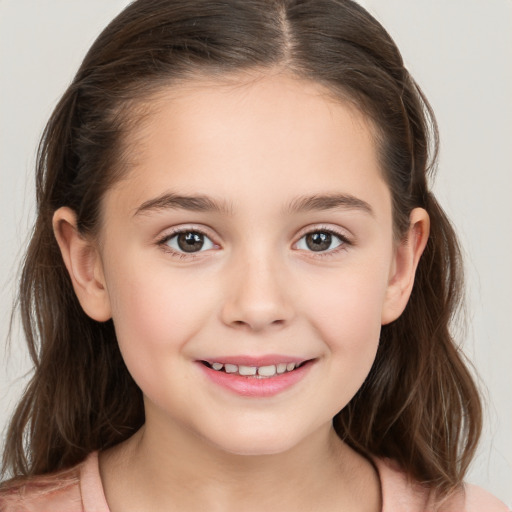 Joyful white child female with medium  brown hair and brown eyes