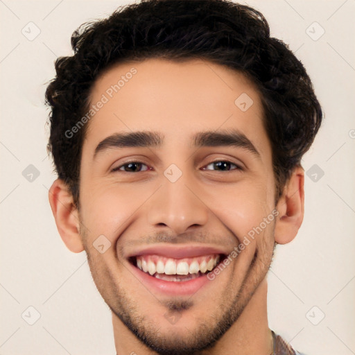 Joyful white young-adult male with short  black hair and brown eyes