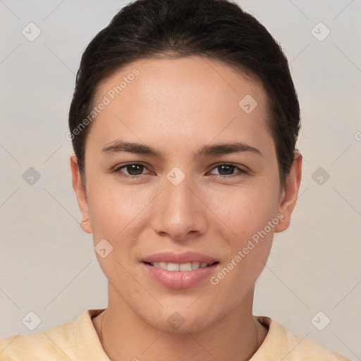 Joyful white young-adult female with short  brown hair and brown eyes