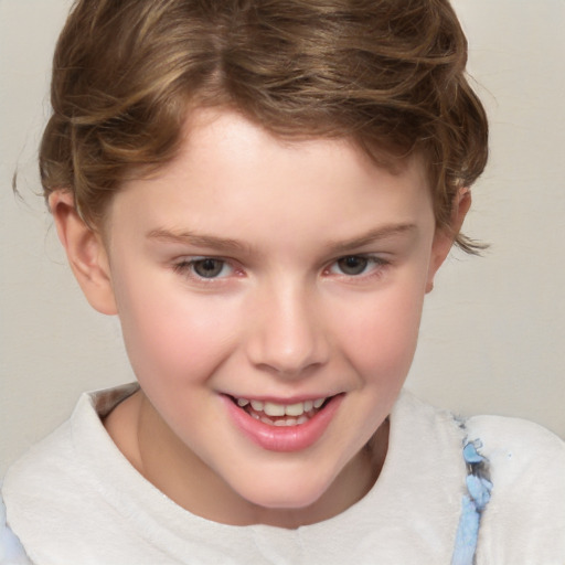 Joyful white child male with short  brown hair and brown eyes