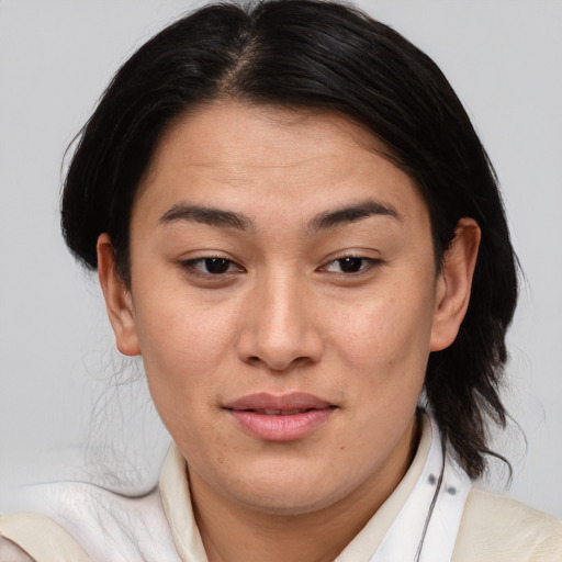 Joyful asian young-adult female with medium  brown hair and brown eyes