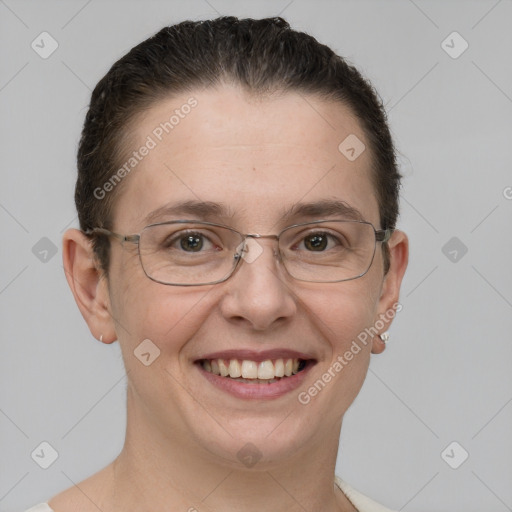 Joyful white adult female with short  brown hair and grey eyes