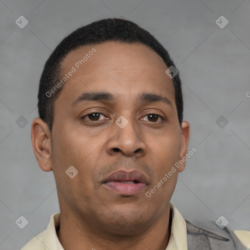 Neutral latino young-adult male with short  brown hair and brown eyes