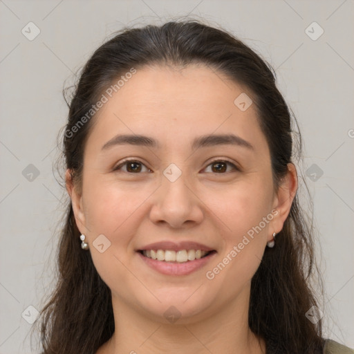 Joyful white young-adult female with long  brown hair and brown eyes