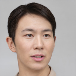 Neutral asian young-adult male with short  brown hair and brown eyes