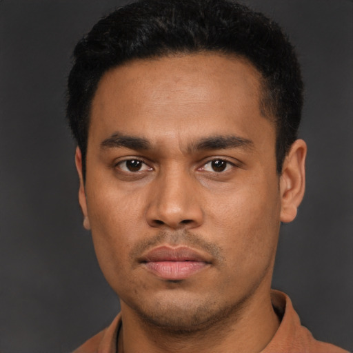 Neutral latino young-adult male with short  black hair and brown eyes