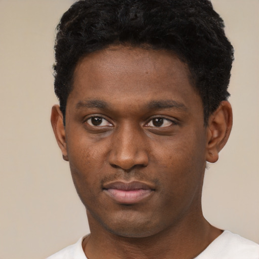 Neutral black young-adult male with short  black hair and brown eyes