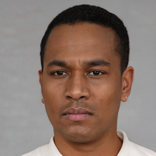 Neutral black young-adult male with short  black hair and brown eyes