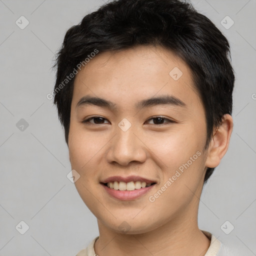 Joyful asian young-adult male with short  black hair and brown eyes