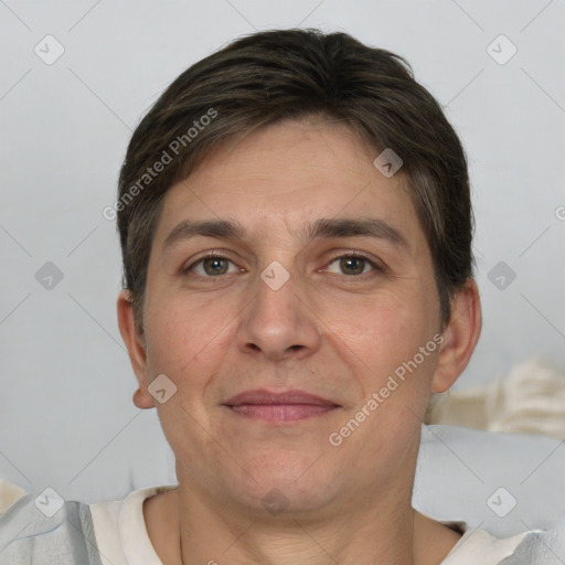 Joyful white adult male with short  brown hair and grey eyes