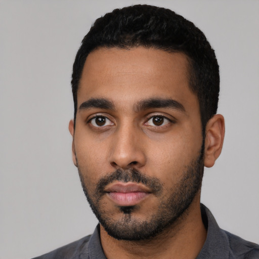 Neutral black young-adult male with short  black hair and brown eyes