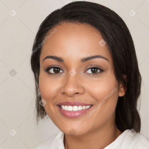 Joyful white young-adult female with medium  black hair and brown eyes