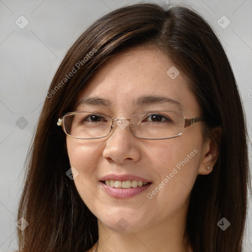 Joyful white adult female with long  brown hair and brown eyes