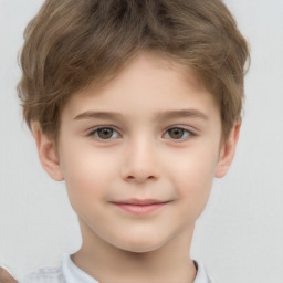 Joyful white child male with short  brown hair and brown eyes