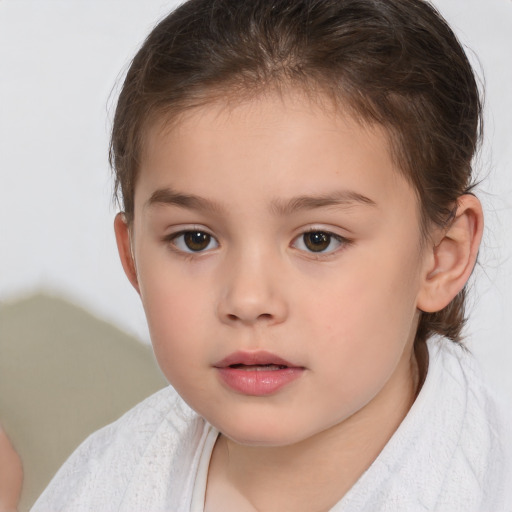 Neutral white child female with short  brown hair and brown eyes