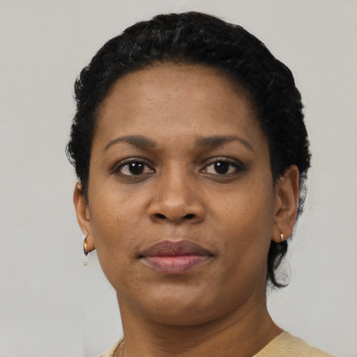 Neutral black young-adult female with short  black hair and brown eyes