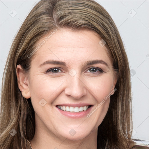 Joyful white young-adult female with long  brown hair and grey eyes