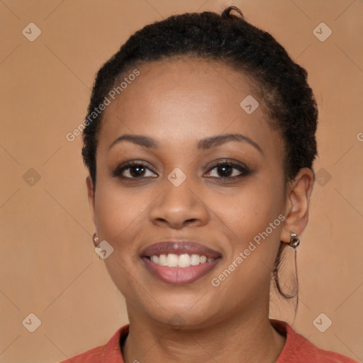 Joyful latino young-adult female with short  brown hair and brown eyes