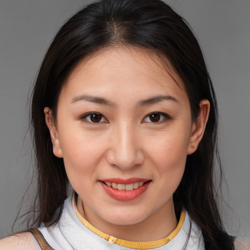 Joyful white young-adult female with medium  brown hair and brown eyes