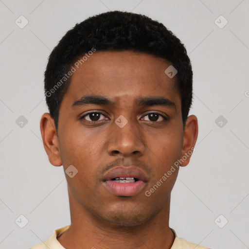 Neutral black young-adult male with short  black hair and brown eyes