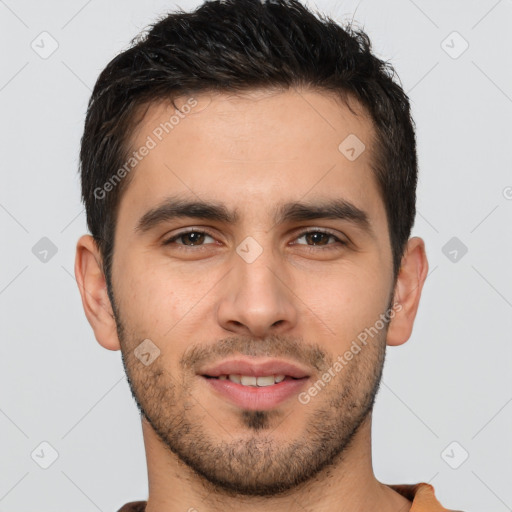 Joyful white young-adult male with short  brown hair and brown eyes