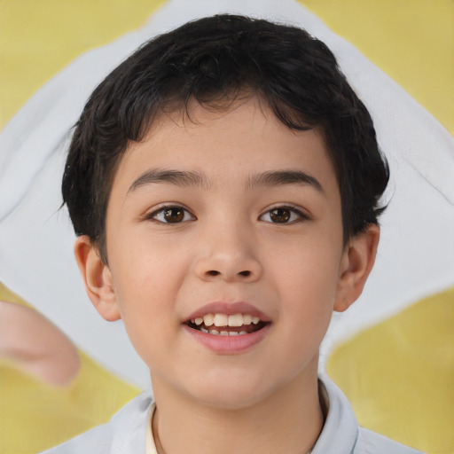 Joyful asian child male with short  brown hair and brown eyes