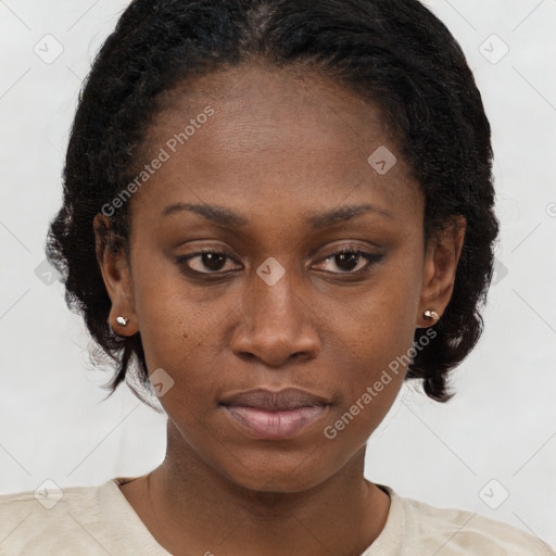 Neutral black young-adult female with medium  brown hair and brown eyes