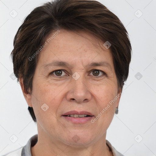 Joyful white adult female with short  brown hair and grey eyes