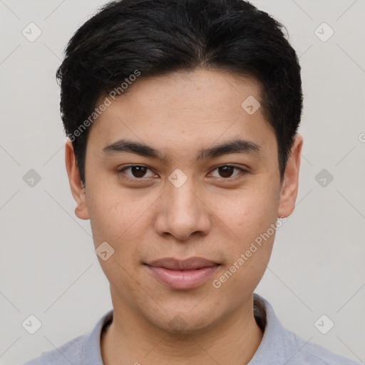 Joyful asian young-adult male with short  brown hair and brown eyes