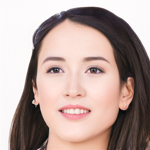 Joyful asian young-adult female with long  black hair and brown eyes