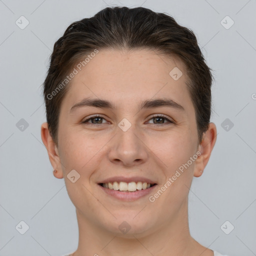 Joyful white young-adult female with short  brown hair and brown eyes