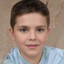 Joyful white child male with short  brown hair and brown eyes