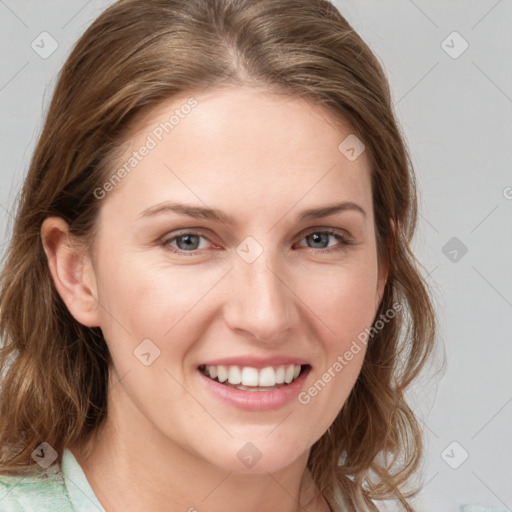 Joyful white young-adult female with medium  brown hair and blue eyes