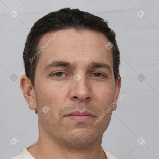 Neutral white adult male with short  brown hair and brown eyes