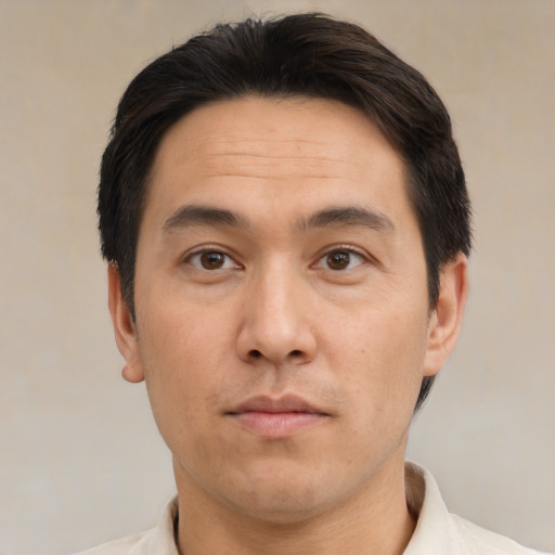 Neutral asian young-adult male with short  black hair and brown eyes